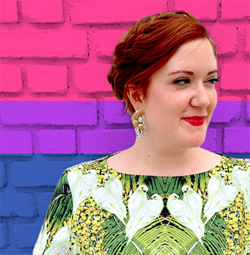 Photo of Unbound's CCO, Sarah Jayne, standing in front of brick wall