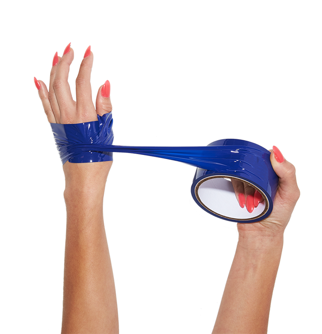 Hands using Tether bondage tape